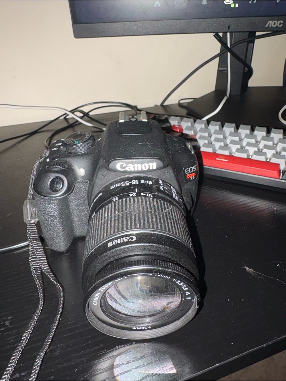 Canon EOS Rebel DSLR Camera with Black 18-55mm Lens